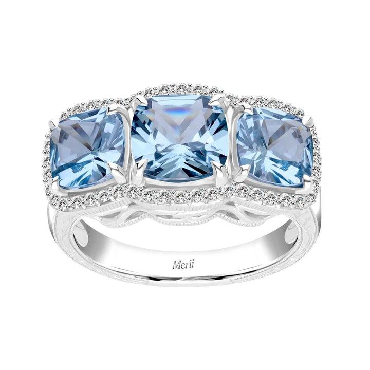 Decorum: Sterling Silver Rhodium Plated Triple Synthetic Aquamarine Spinel Cushion and CZ Ring