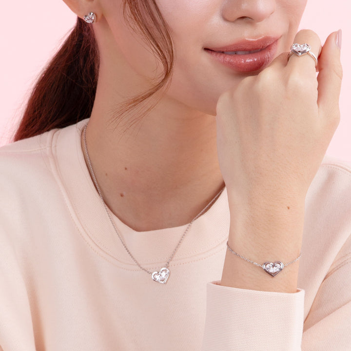 To Have and To Hold: Rhodium Plated 925 Sterling Silver Heart Bracelet with Pear Cut Cubic Zirconia