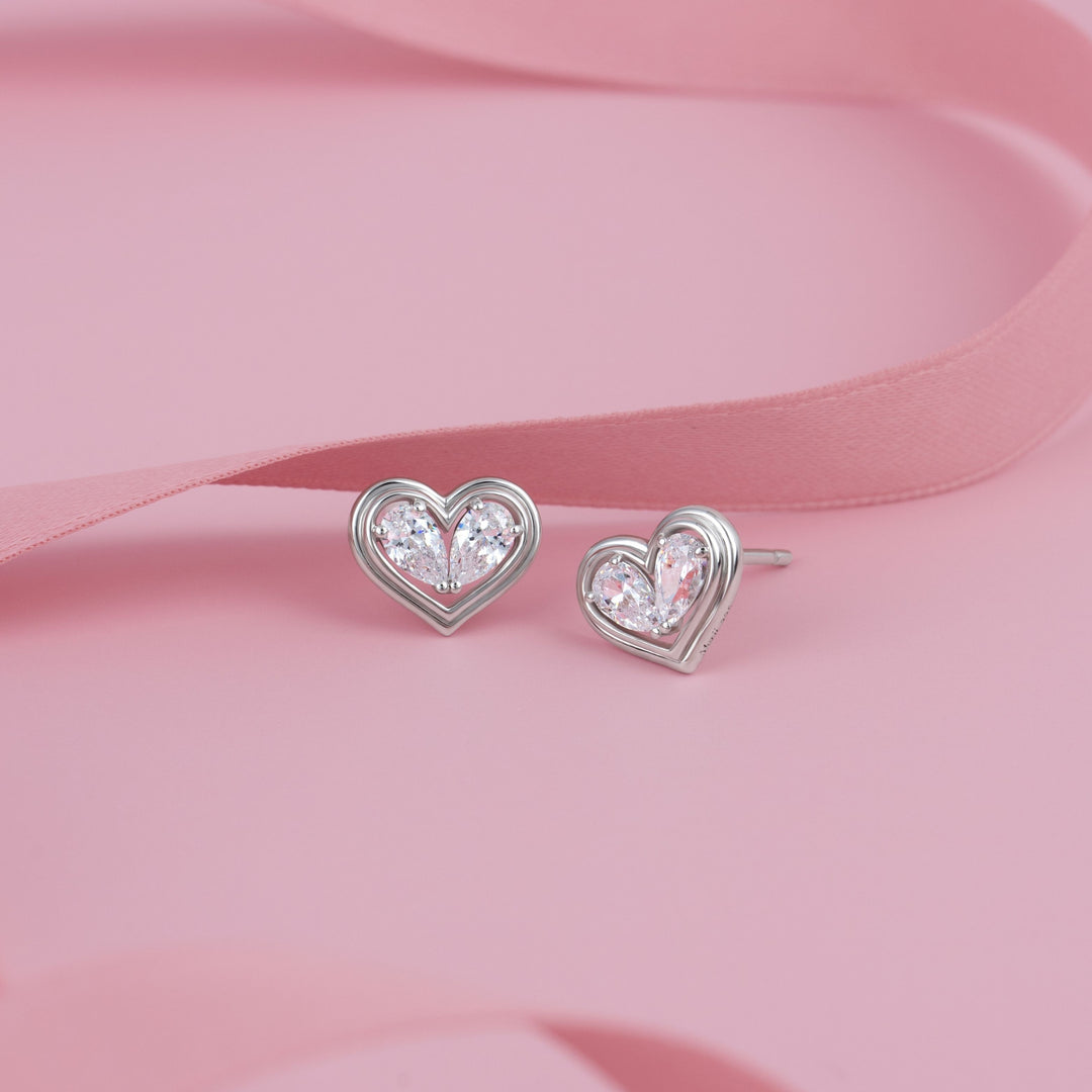 To Have and To Hold: Rhodium Plated 925 Sterling Silver Heart Earrings with Pear Cut Cubic Zirconia