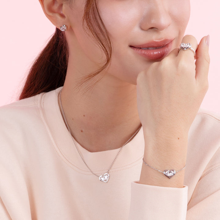 To Have and To Hold: Rhodium Plated 925 Sterling Silver Heart Earrings with Pear Cut Cubic Zirconia