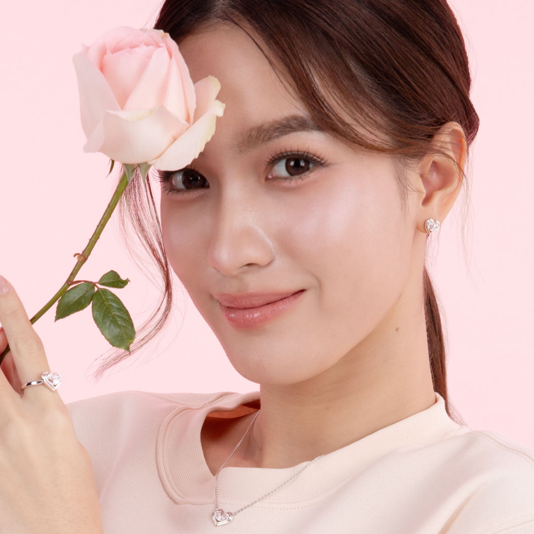 To Have and To Hold: Rhodium Plated 925 Sterling Silver Heart Earrings with Pear Cut Cubic Zirconia