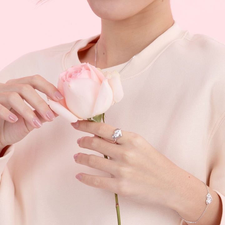 To Have and To Hold: Rhodium Plated 925 Sterling Silver Heart Ring with Pear Cut Cubic Zirconia