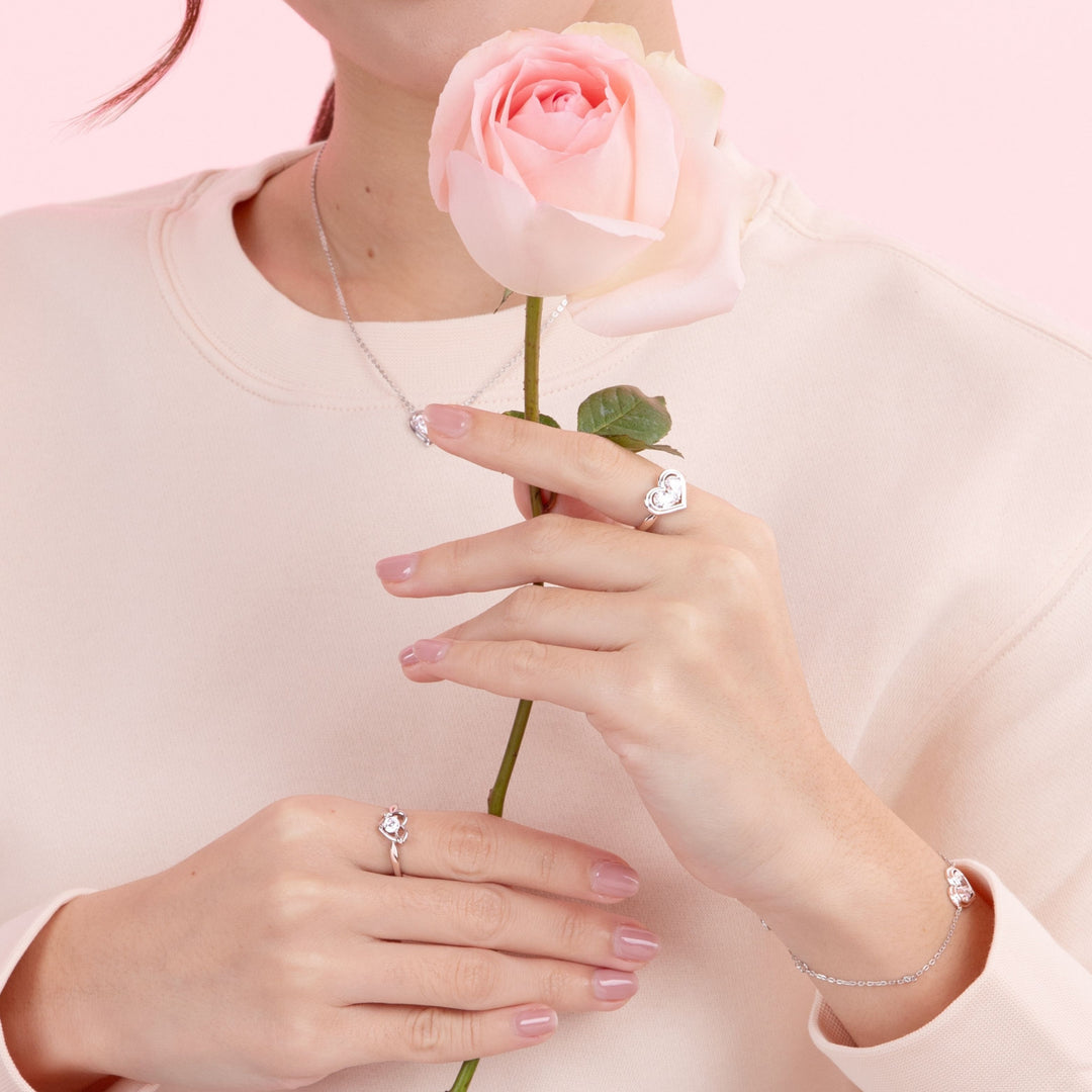 To Have and To Hold: Rhodium Plated 925 Sterling Silver Heart Ring with Pear Cut Cubic Zirconia