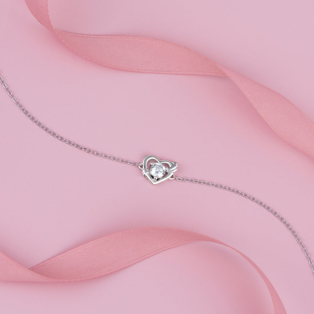 To Have and To Hold: Rhodium Plated 925 Sterling Silver Heart Bracelet with Round Cut Cubic Zirconia