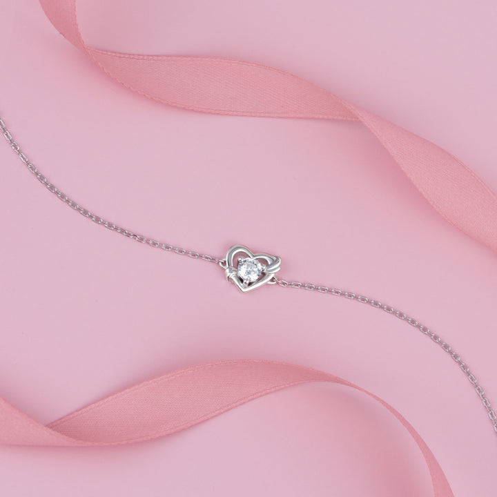To Have and To Hold: Rhodium Plated 925 Sterling Silver Heart Bracelet with Round Cut Cubic Zirconia