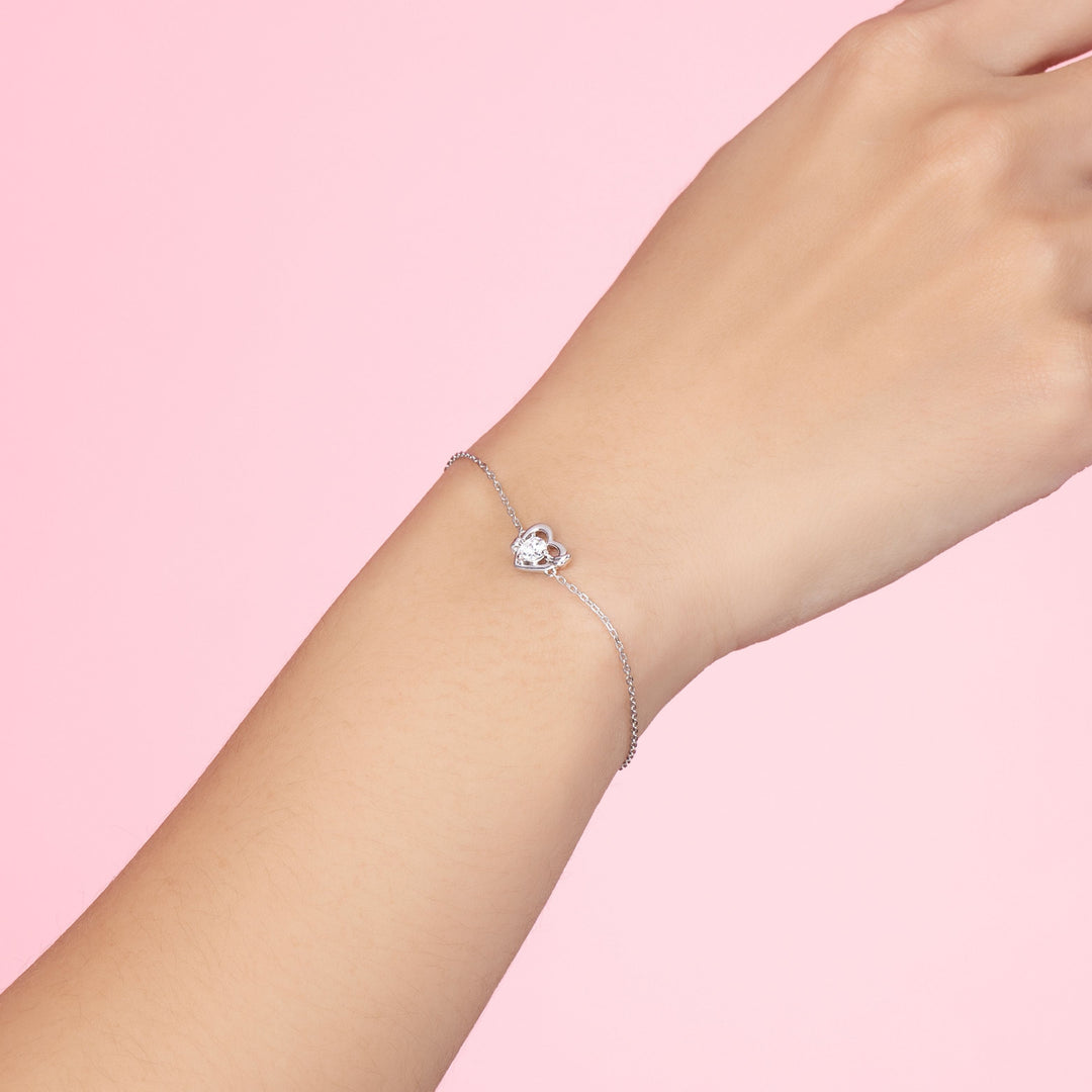 To Have and To Hold: Rhodium Plated 925 Sterling Silver Heart Bracelet with Round Cut Cubic Zirconia