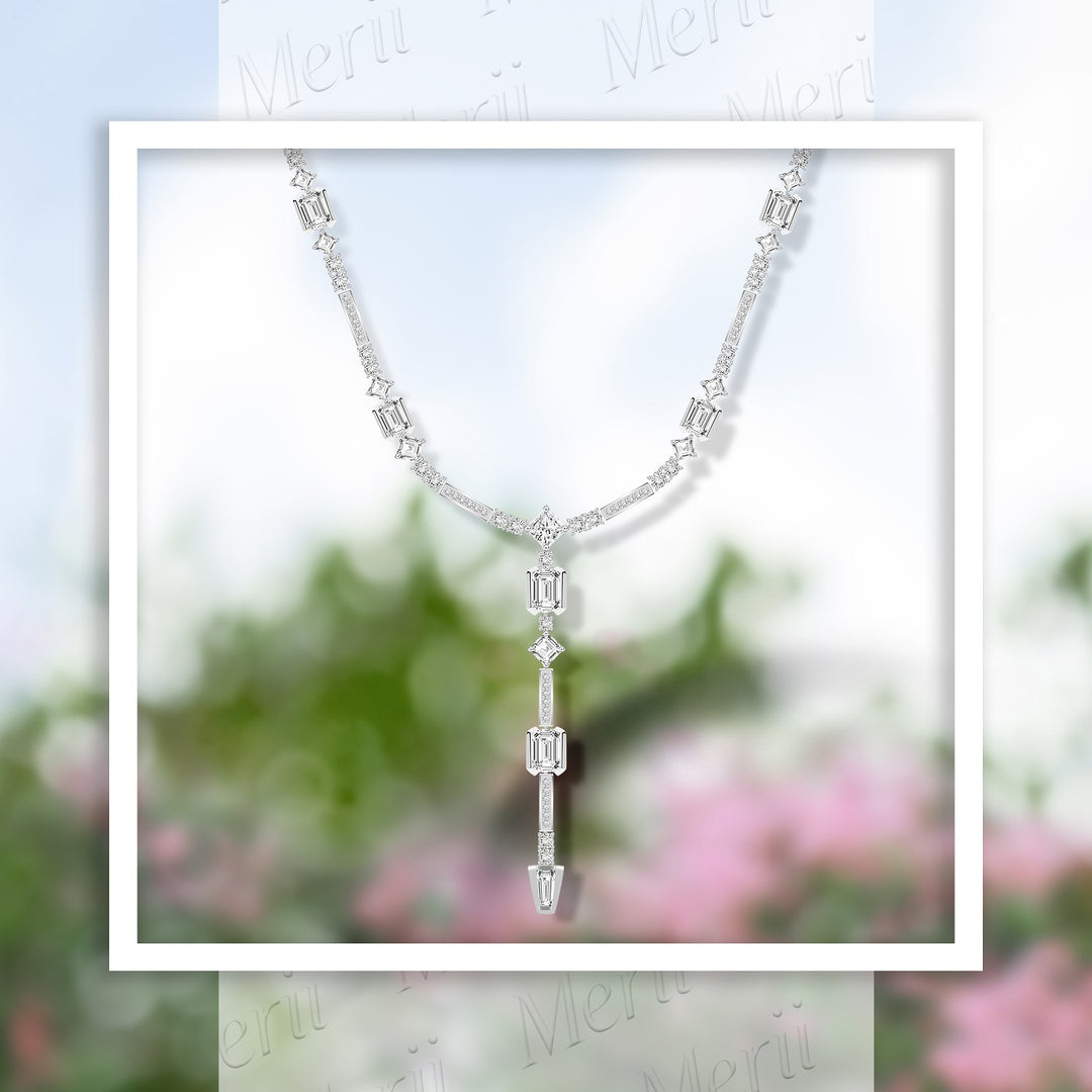 Quadri: Silver rhodium plated with baguette cut CZ channel and prong set  17 3/8" drop necklace