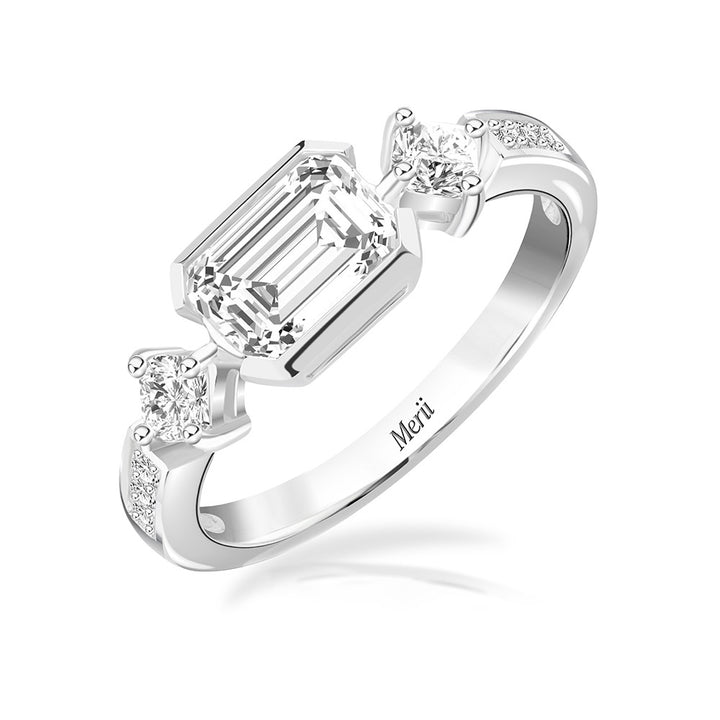 Quadri: Silver rhodium plated with CZ baguette cut channel and prong set ring